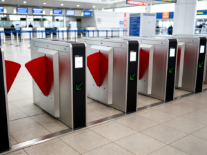 Compact curved shell subway flap turnstile